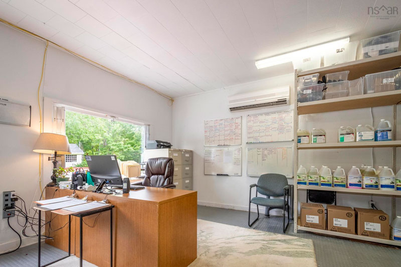 Bright open space with plenty of room for shelving